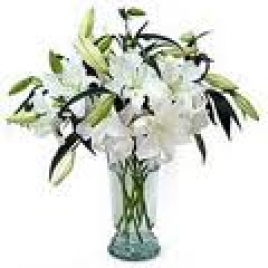White Lilies In A Glass Vase